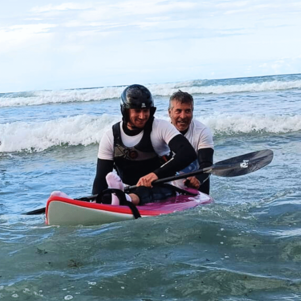 Jonas Van de Steene doing adapted surf kayaking